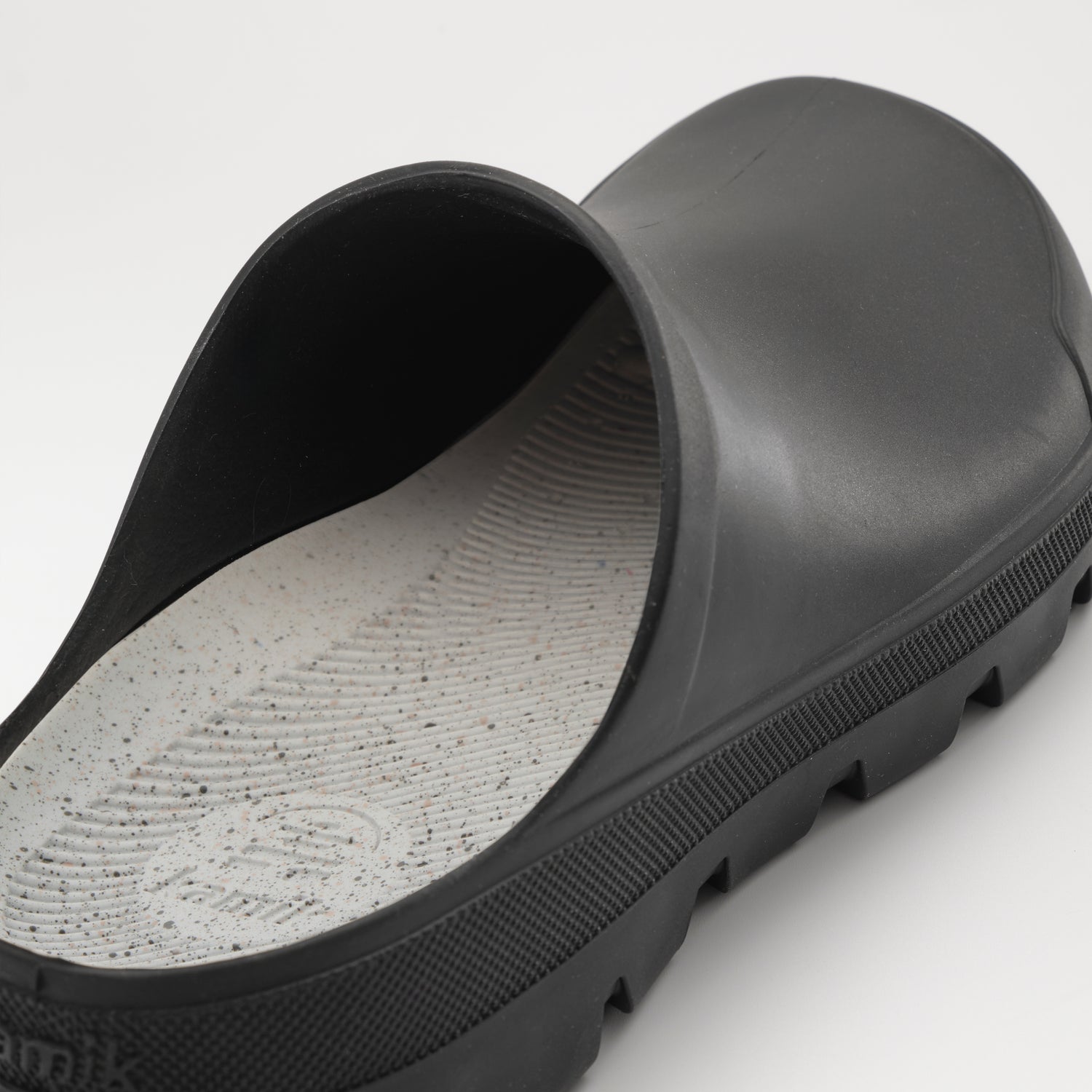Black : Nova Unisex Waterproof Clogs - Three-Quarter Back View